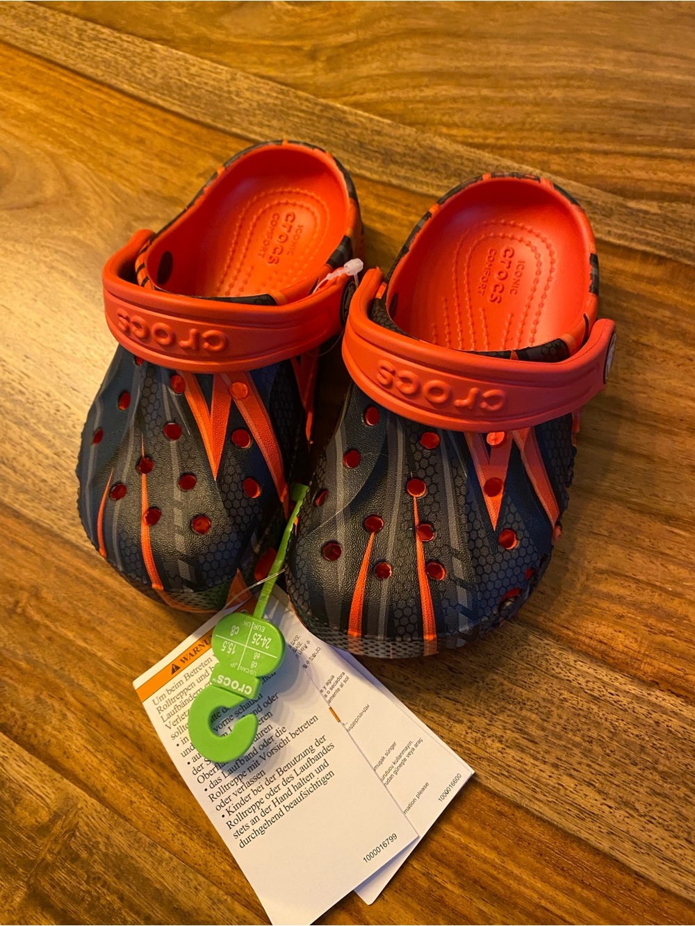 Crocs Kids' Red and Black Clog - Lightweight Comfort.  Toddler size 8